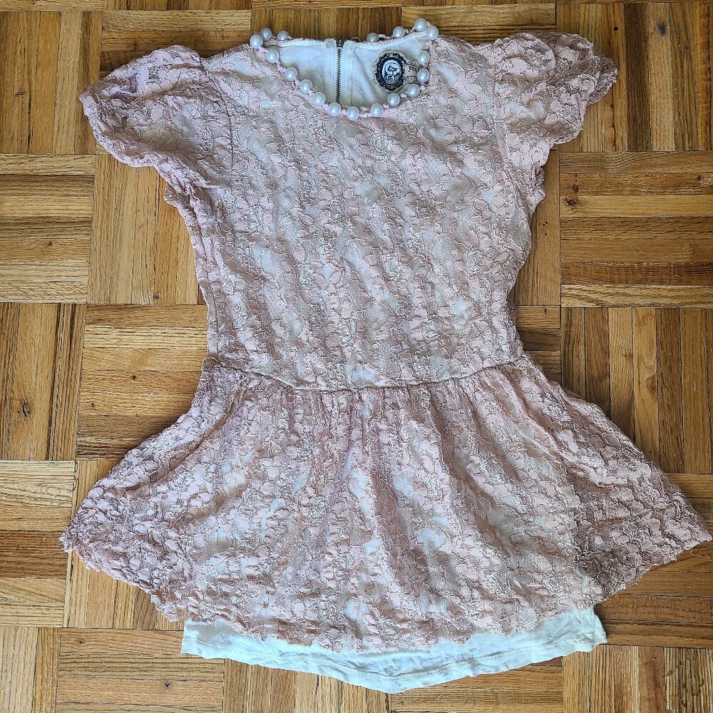 Adorable lace peplum top. Size small.